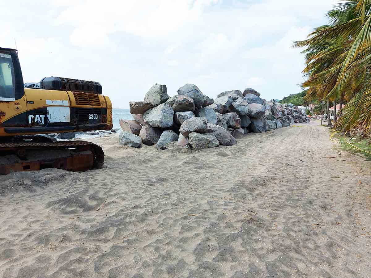 Boulders ready for breakwater building at Frigate Bay